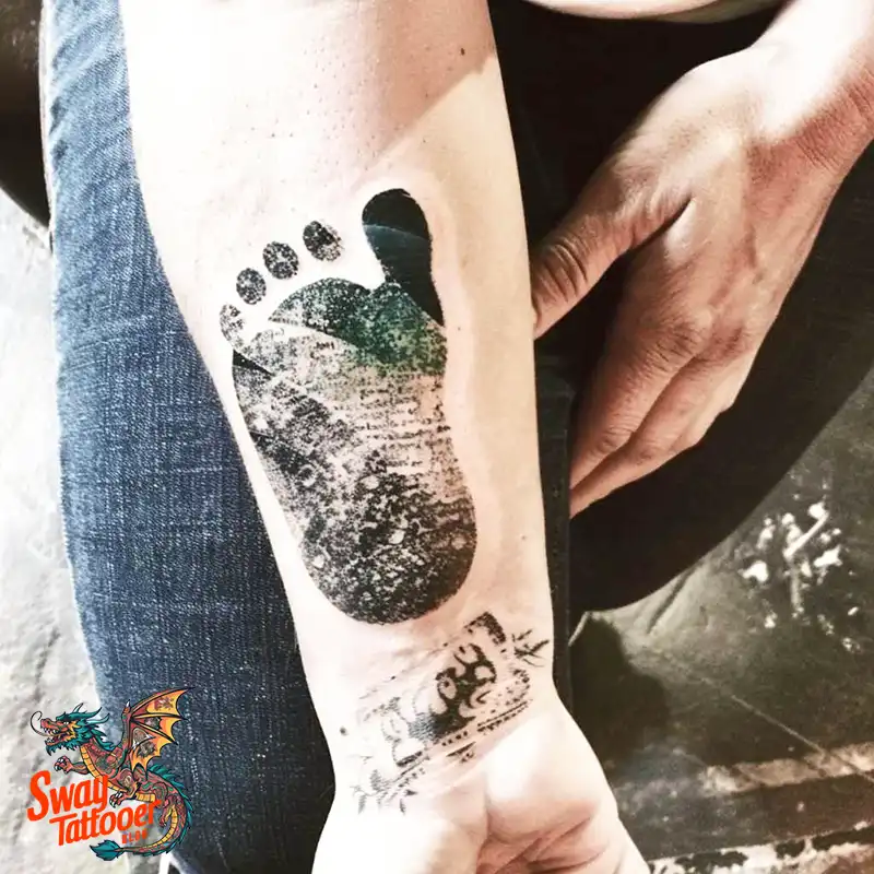 Baby Footprint Tattoos: Cherish Every Step in Ink Forever 13 baby footprint tattoo