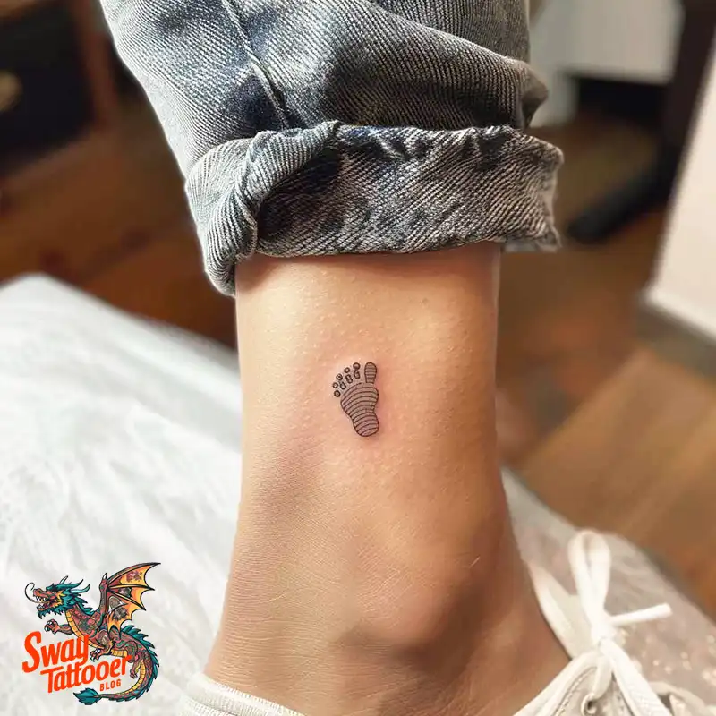 Baby Footprint Tattoos: Cherish Every Step in Ink Forever 9 baby footprint tattoo