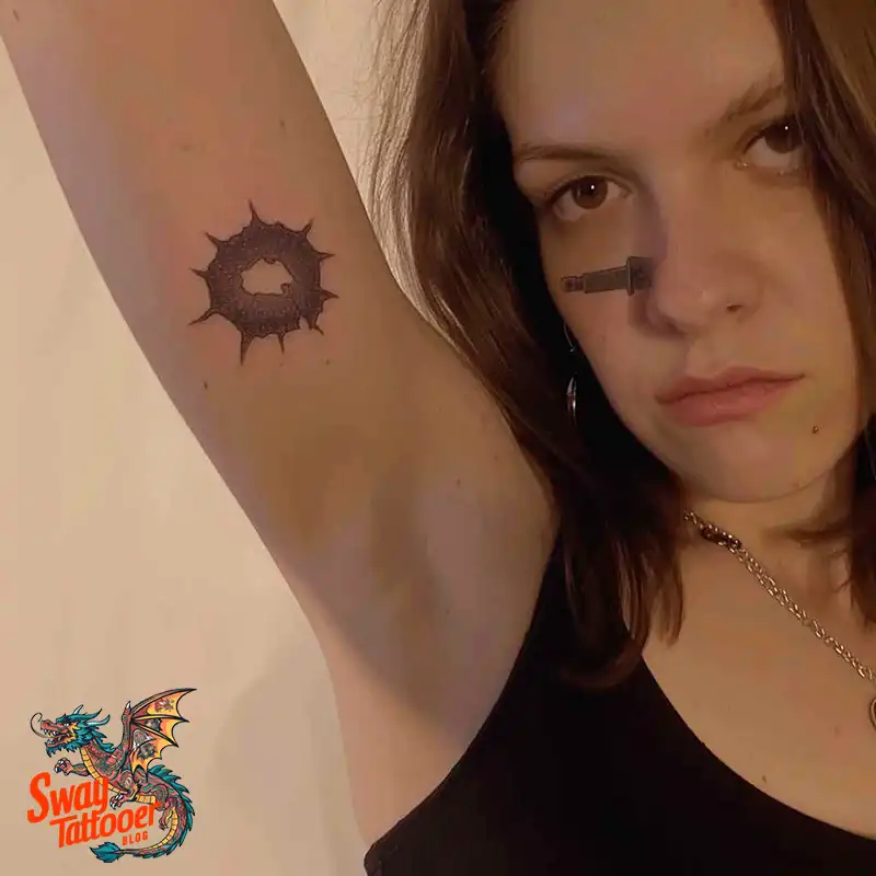 bullet hole tattoo